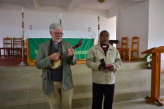 Leading worship with Bishop Gilbert
